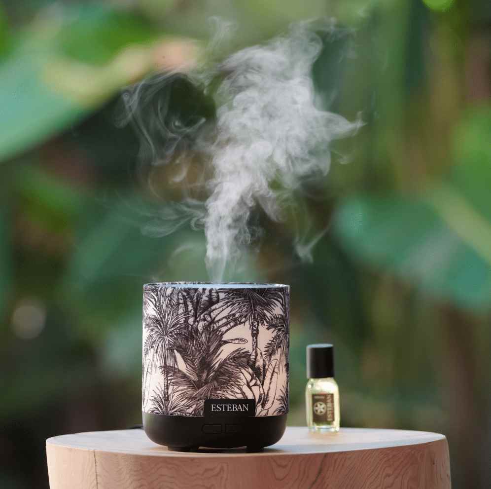 Difusor de aromas eléctrico con aceite esencial